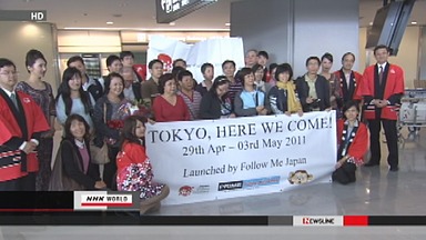 Tourists return to Tokyo