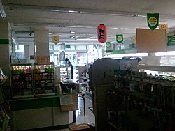 darkened convenience store to save electricity