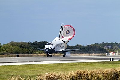 Space Shuttle Discovery touches down at KSC on its final mission