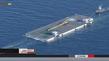 Massive floating platform heads for Fukushima