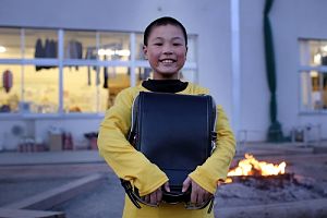 Rikuzentakata boy w/ backpack