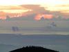 Hikers awaiting sunrise on the eastern rim of the caldera