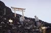Torii gate & guardian Shisa lions near Mt. Fuji summit